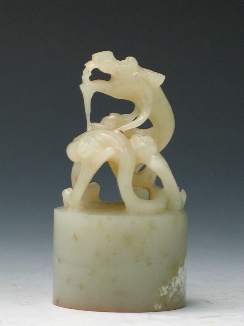 Chinese carved white jade dragon seal. (1 of 3)