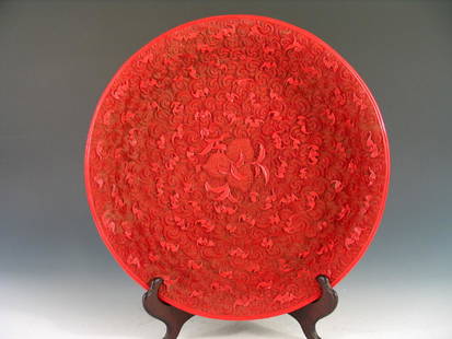 Chinese carved cinnabar charger, Qianlong Mark.: Chinese carved cinnabar charger,, Qianlong mark. Diameter 33 cm. Provenance: A VA estate.