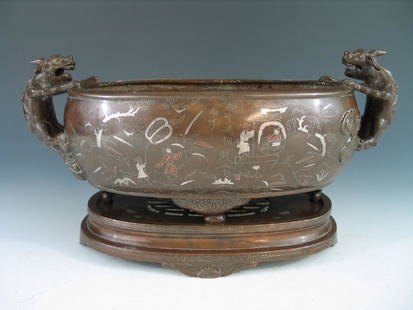 Chinese bronze incense burner with stand: Chinese bronze incense burner with stand. Total height 20 cm. Length 38 cm. Width 18.5 cm. Provenance: A VA estate.