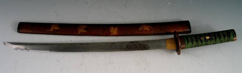 Japanese sword with lacquer scabbard.: Japanese sword with lacquer scabbard. Length 45.5 cm.