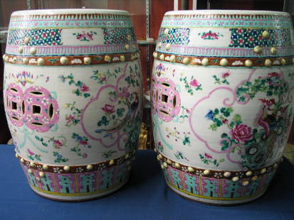 Pair Chinese famille rose porcelain garden seats.: Pair Chinese famille rose porcelain garden seats. Ht 46 cm. Diameter 35 cm.