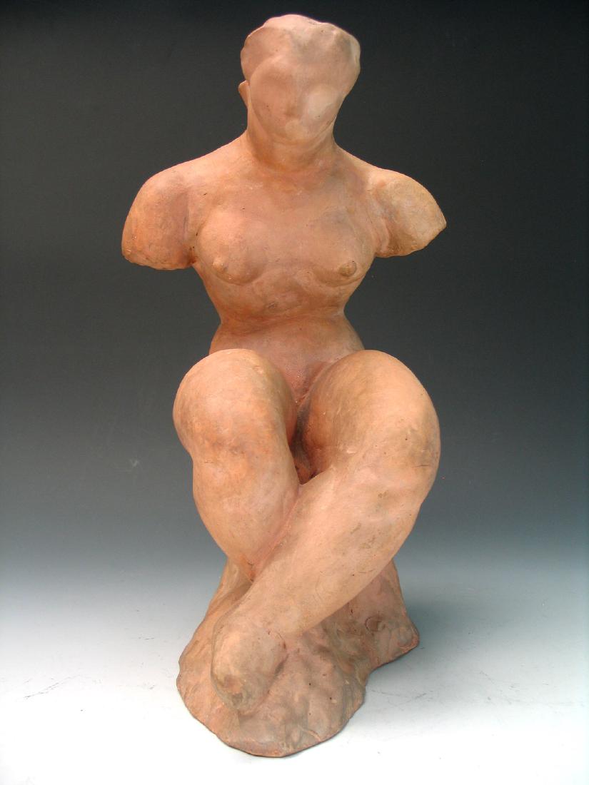 Female Nude Terra Cotta, signed and dated 1919, by: Female Nude Terra Cotta, signed and dated 1919, by follower of Alexander Archipenko, signature illegible. Ht 35.5 cm.