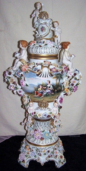 Fine European Meissen Porcelain Vase : Decorated with Cherubs, Flowers, and Crown on Top. Hand Painted Romantic Scene; Signed 36"h x 17"w x 11"d approx. weight: 45 lbs