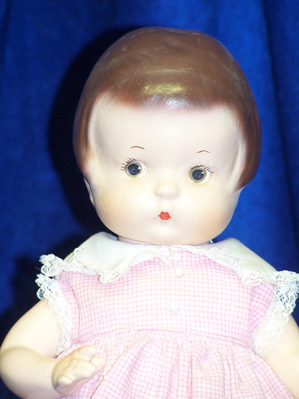 EFFANBEE. PATSY ANN: 14" COMP BODY, PAINTED EYES,MOUTH. MOLDED HAIR. COSTUME BY HELEN MOE. FACE REPAINT. VERY NICE DOLL.