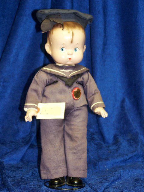 EFFANBEE SKIPPY: 14" CLOTH BODY. ORIGINAL BUTTON. ORIGINAL SAILOR COSTUME. PAINTED GLANCING EYES. GOOD COND. SAIL AWAY WITH SKIPPY!