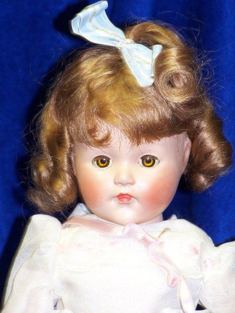 EFFANBEE. ANNA SHIRLEY: 22" OPEN/CLOSE BROWN EYES. OPEN PAINTED MOUTH. REPLACED COSTUME AND WIG. EXCELLENT CONDITION. A CUTIE.