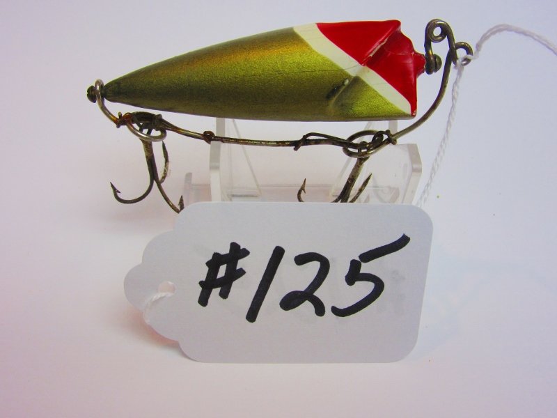 Bite-Em-Bate Fishing Lure: Revolving Bait 3-1/2" - Aluminum body w/Red Head All Lures are selling "AS IS, WHERE IS" Bid your judgement. All sales are Final.