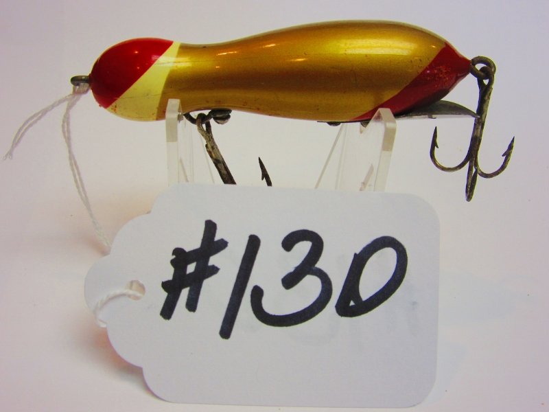 Bite-Em-Bate Fishing Lure: WaterMole (Round Ahead) - Gold body w/Red & White Head & Red Tail All Lures are selling "AS IS, WHERE IS" Bid your judgement. All sales are Final.
