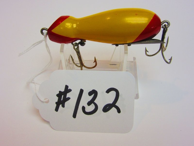 Bite-Em-Bate Fishing Lure: WaterMole (Flat Head) - Yellow body w/Red Head & Red Tail All Lures are selling "AS IS, WHERE IS" Bid your judgement. All sales are Final.