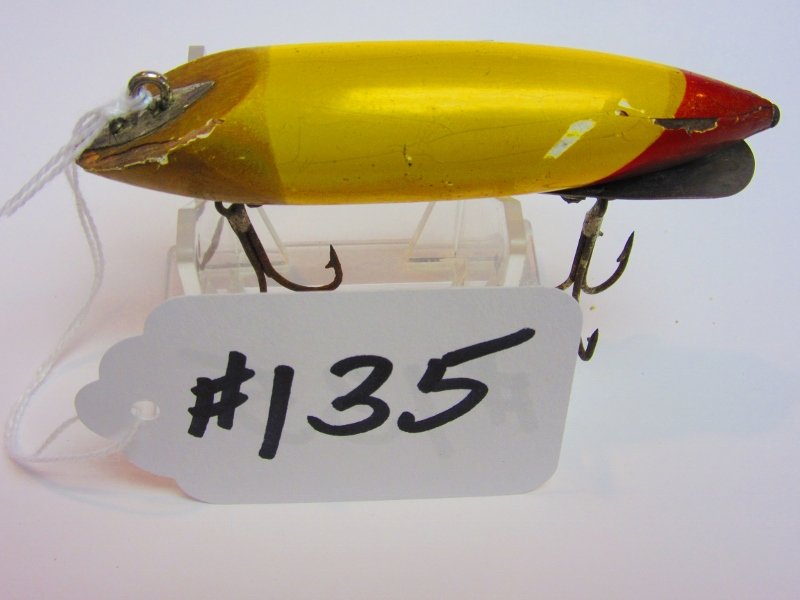 Bite-Em-Bate Fishing Lure: Wiggler - Yellow body w/Gold Head & Red Tail All Lures are selling "AS IS, WHERE IS" Bid your judgement. All sales are Final.
