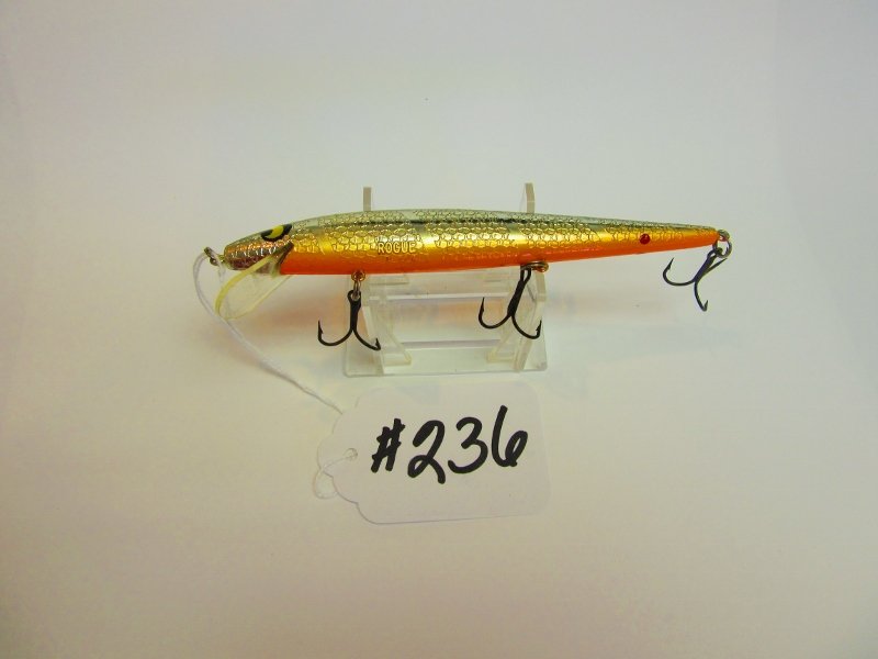 Smithwick Fishing Lure: Suspending Rogue - Black back, Silver sides, Orange belly All Lures are selling "AS IS, WHERE IS" Bid your judgement. All sales are Final.