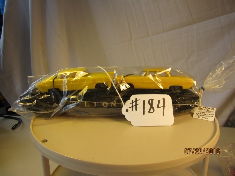 Lionel: Description: Lionel Flat Car w/ (2) Yellow Cars n-Bag Scale: O Scale Engine Number: 6424 Catergory: Toy Train Note: All Items Selling AS-IS. All Sales are Final. Bid Your Judgement