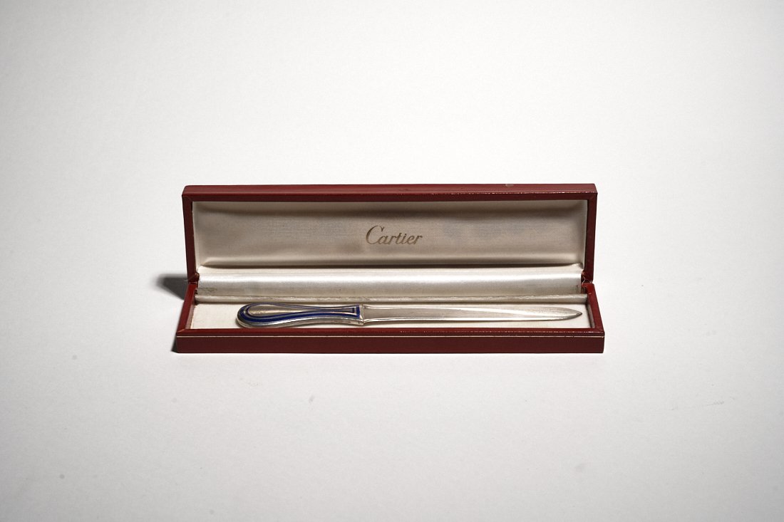 Cartier Sterling Silver Letter Opener: A fine and rare sterling silver letter opener by Cartier. Enamel accents.Marked nearh handle. In original box7.25" Length