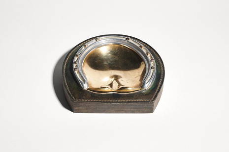 Hermes Horse Shoe Ashtray, Paul Dupre Lafon: A 1950s stacked leather ashtray in the form of a horseshoe, designed by Paul Dupre Lafon. Marked on bottom. 6.25" x 6.25" x1.25"