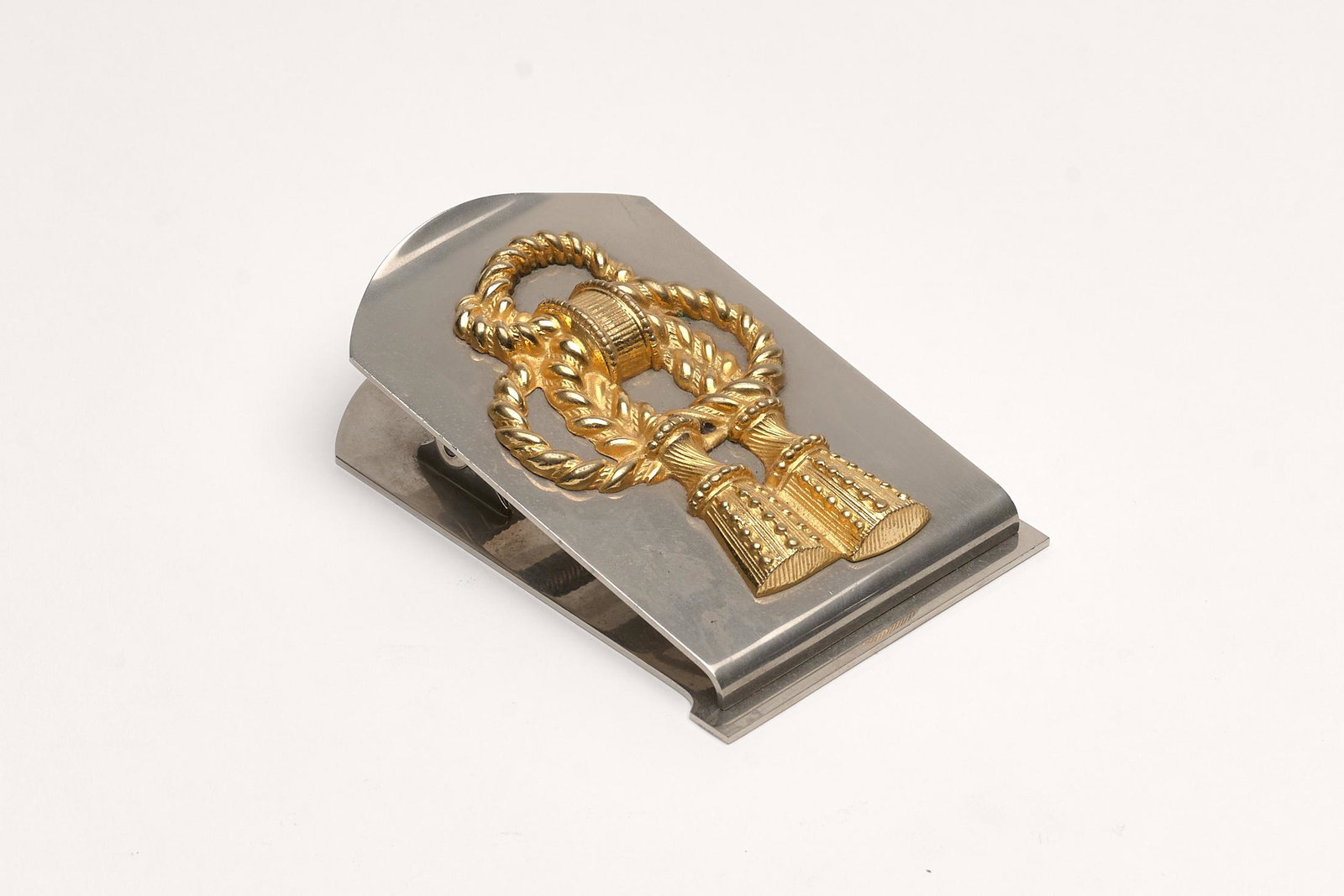 Hermes Tassel Paper Clip: A fine paper clip by Hermes with a gilt tassel. 1960s 4.5" x 2.75"