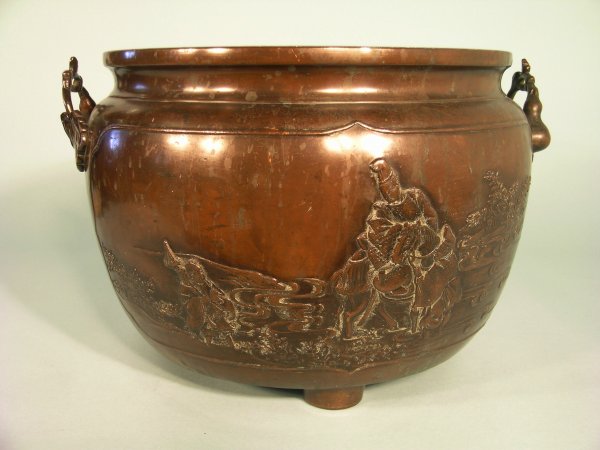 A Japanese bronze jardiniere, circa 1900, cast in r