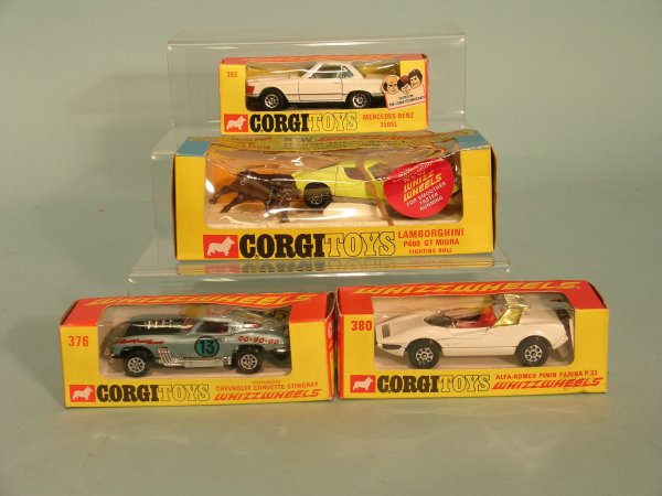 Four Corgi cars, early Whizz Wheels production, a n