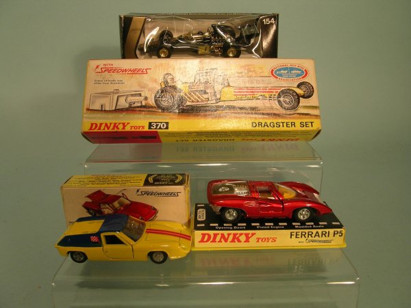 A group of three Dinky Toys fitted with Speed Wheel