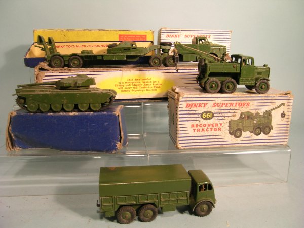 A group of six Dinky Toys army vehicles in origina
