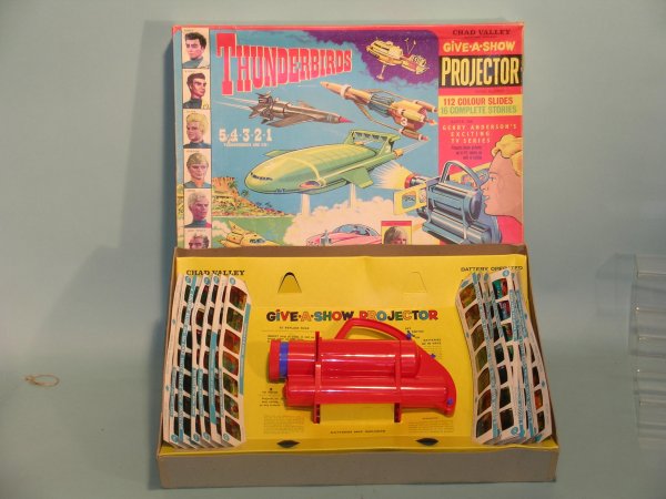 A Chad Valley Thunderbirds 'Give a Show' projector: A Chad Valley Thunderbirds 'Give a Show' projector circa 1966, this item exclusively themed to Thuderbirds contains 112 colour slides from the series