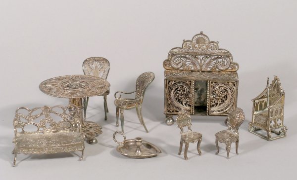 A selection of dolls' house furniture, to include