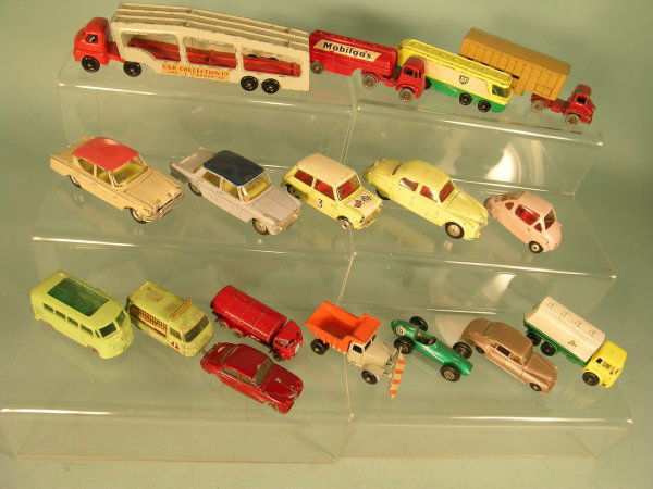 A collection of approximately 50 unboxed diecast t: A collection of approximately 50 unboxed diecast toys, mainly Matchbox and Corgi, items include a Matchbox car transporter in red and grey, a Major Pack Mobilgas wagon, a Corgi Austin Cooper, a Ford C