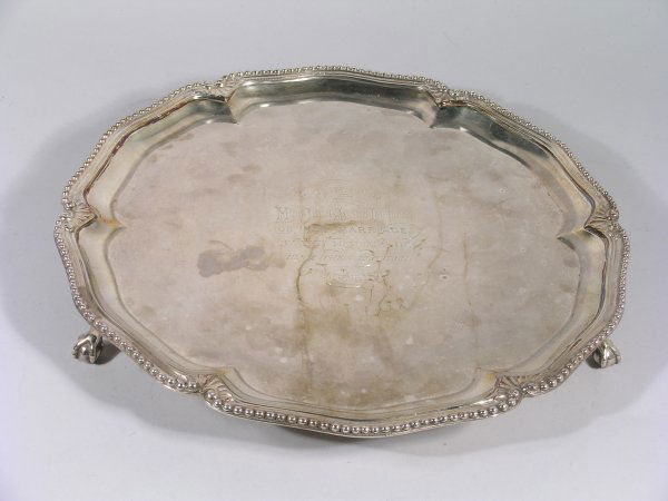 A silver salver, Thomas Heming, London 1771, of he: A silver salver, Thomas Heming, London 1771, of hexafoil shape, below a beaded and anthemion rim (later addition) and raised on three later, claw and ball feet, stamped 'RG' for Robert Garrard and bea