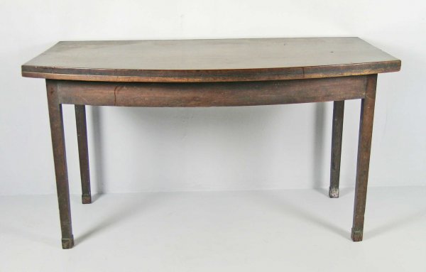 A George III bow front side table, mahogany, the