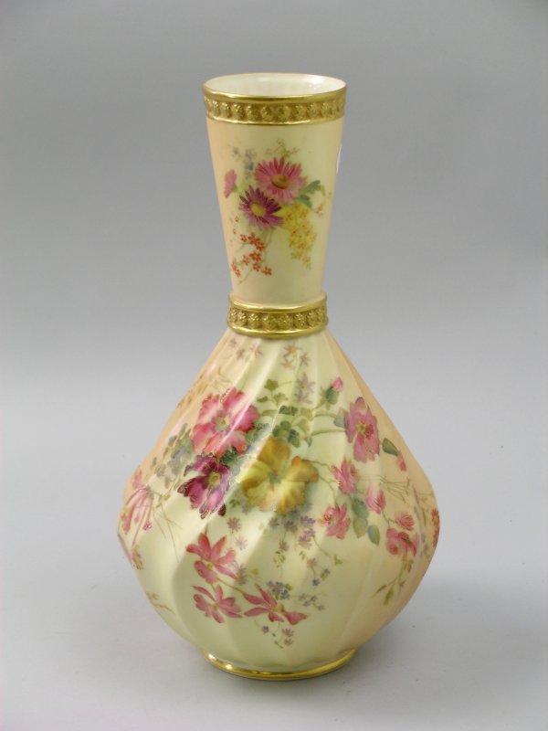 A Royal Worcester wrythen moulded vase, date code