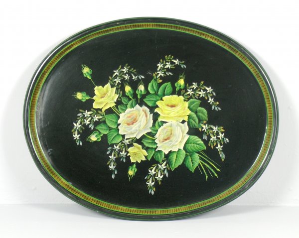 A Victorian oval papier-mache black lacquered tea