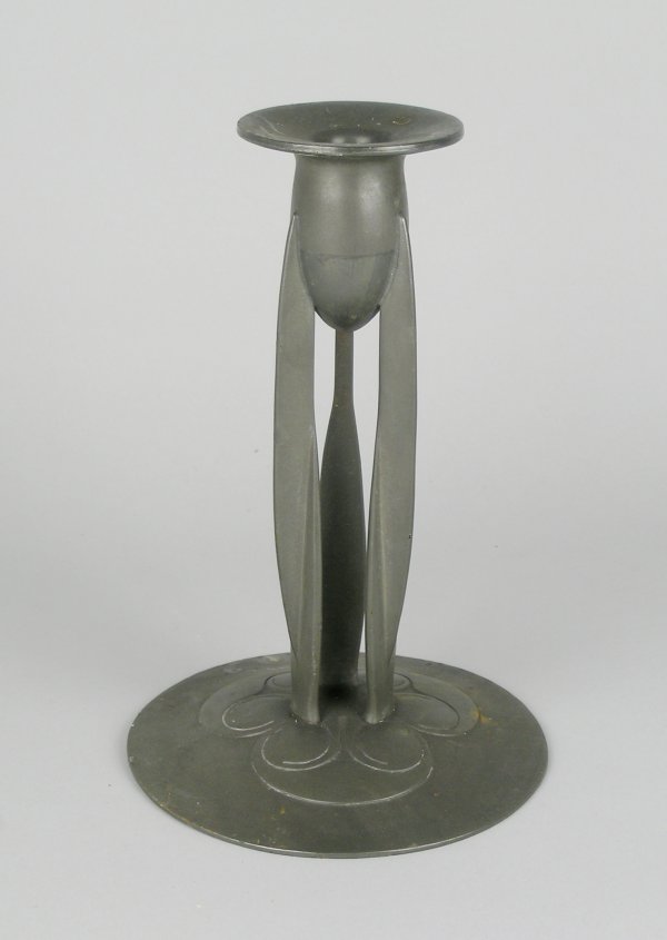 A pewter candlestick stamped 'Tudric, pewter 0223'