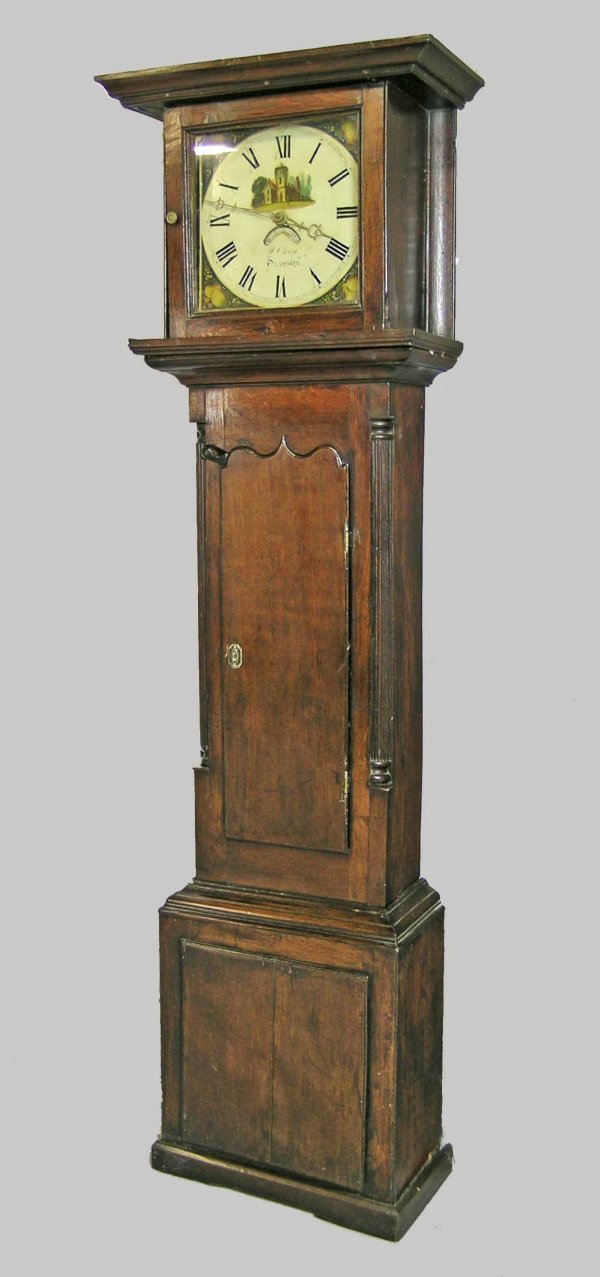 A George III thirty hour longcase clock oak the 11