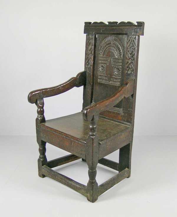 An open arm chair, 17th century oak, probably Wes