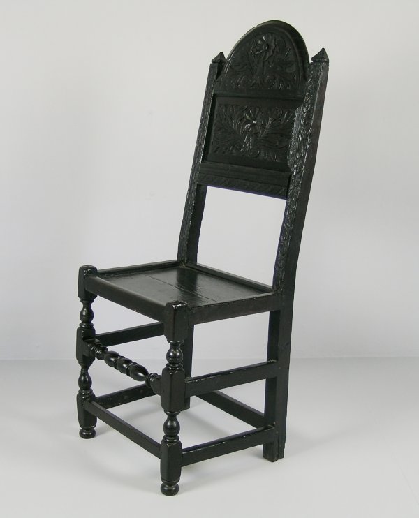 A back stool, 17th century and later, dark staine