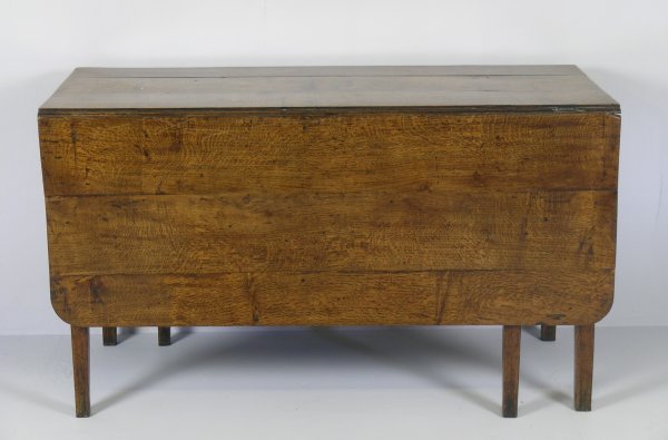 A George III drop-leaf dining table, oak, the rec