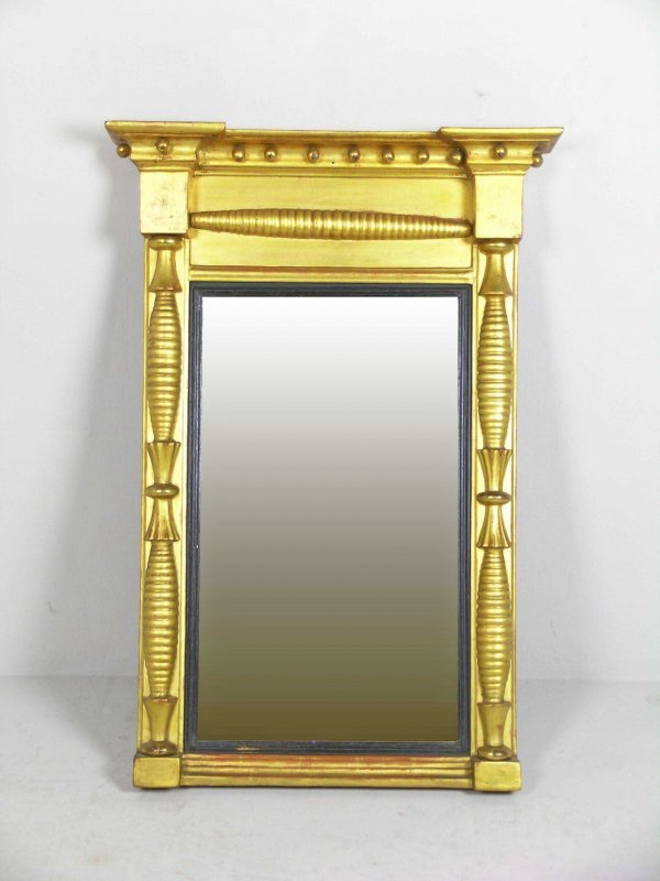 A giltwood and gesso pier mirror, 19th century, t