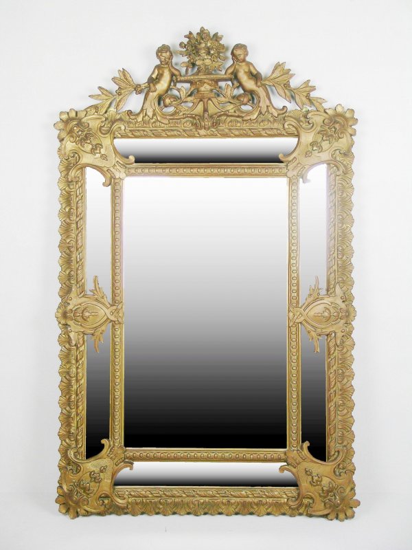 A Florentine style wall mirror, 19th century, gil