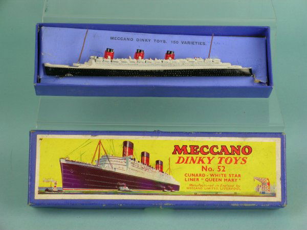A boxed Dinky Toy No. 52, White Star Liner, 'Quee: A boxed Dinky Toy No. 52, White Star Liner, 'Queen Mary' the model dating from 1935 non roller version is complete with inner box inset, masts, very slight paint loss to the black hull
