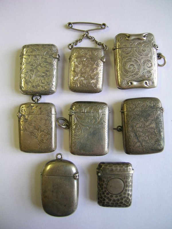 Eight silver vesta cases, each variously decorate