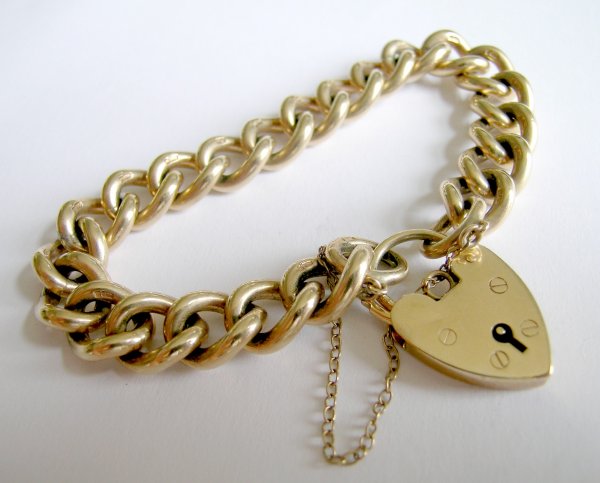 A 9ct yellow gold bracelet, the uniform curb link