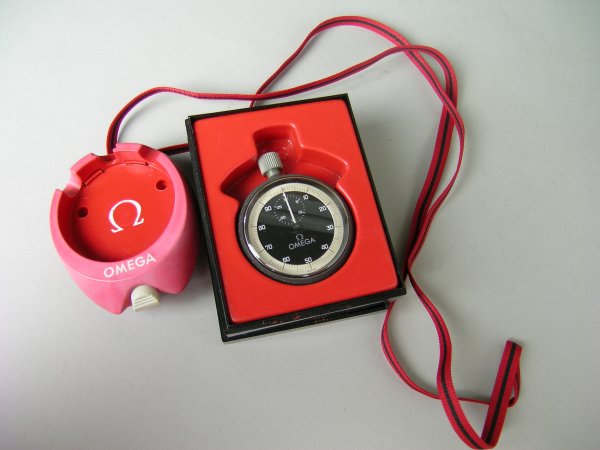 An Omega stopwatch, in original case and with Ome