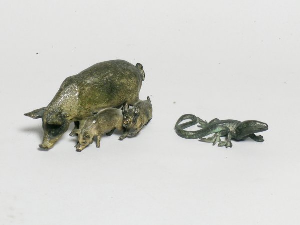 A cold panted Austrian bronze group of a sow and
