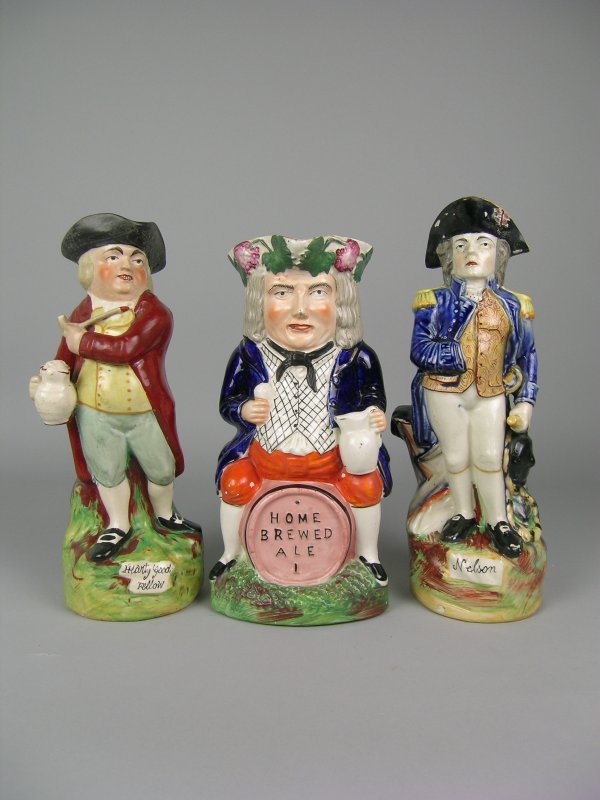 Three toby jugs to include; The Landlord, titled '