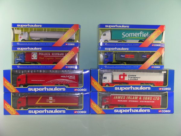 A group of approximately twenty four boxed Corgi Su