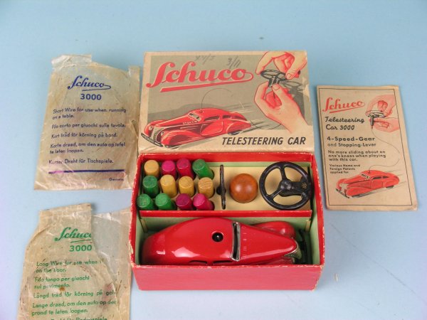 A boxed Schuco Tele steering car dating from the 1