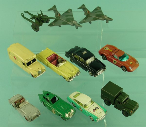 A group of eleven Dinky and Corgi Toys without box
