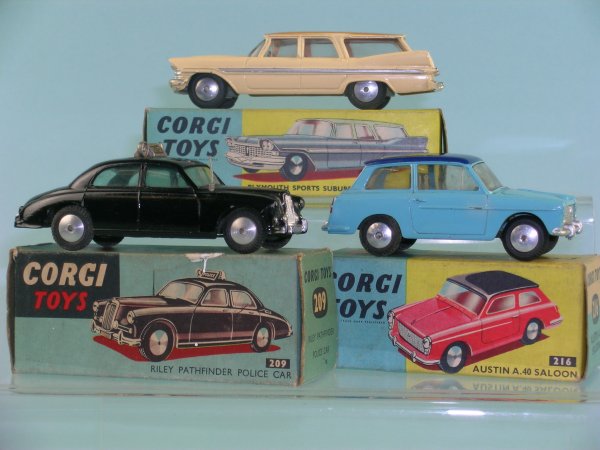 A group of three boxed Corgi Toys Saloons, a No. 2