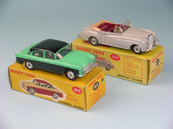 Two boxed Dinky Toy cars, the first a No. 194 Bent
