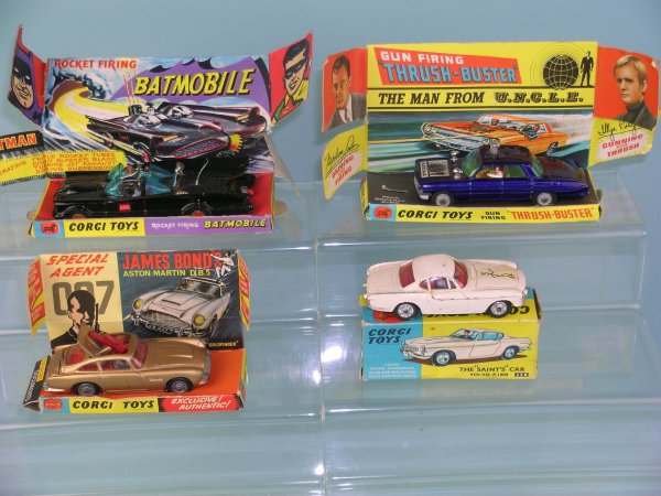 A group of four boxed Corgi television related toy
