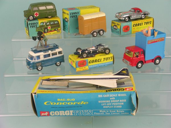 A group of seven boxed Corgi toys to include a No.